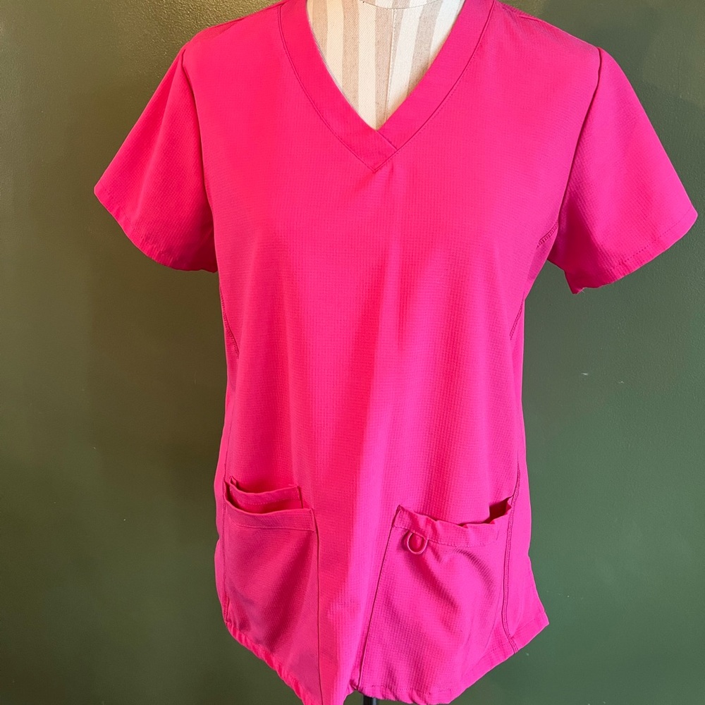 Bright pink scrub top